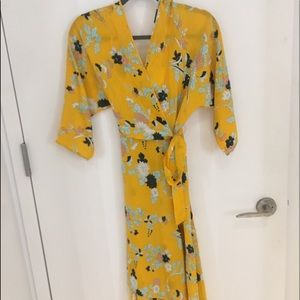 Long sleeve asymmetric hem floral silk wrap dress